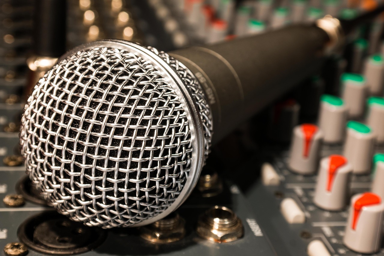 Headphones and a microphone on a desk
